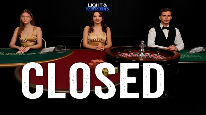 Light and Wonder live casino dealers at closed gaming tables with roulette wheel and card games