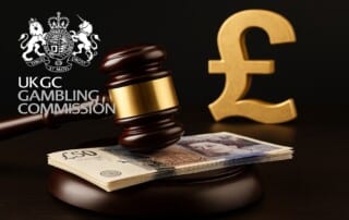 Judge’s gavel and British pound notes symbolizing UK Gambling Commission fines and enforcement in 2025.