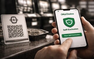 MyChoice self-exclusion app displayed on smartphone with QR code scanner at New Zealand gambling venue