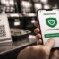 MyChoice self-exclusion app displayed on smartphone with QR code scanner at New Zealand gambling venue