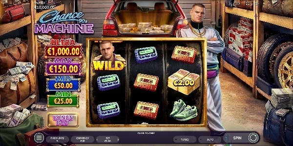Chance Machine 90s Slot Game | Endorphina – Weekly Review Chance Machine 90s slot reels showing cassette symbols, a green shoe symbol, a wild character symbol and jackpot values beside a garage scene.