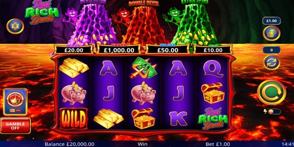 Reel Rich Devils Slot Game | Light & Wonder – Weekly Review Reel Rich Devils slot reels showing gold bars, treasure chests, card symbols, a pig wild symbol and jackpot values above a lava-themed game screen.
