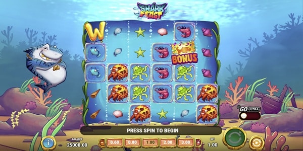 Shark Feast Slot Game | Betsoft – Weekly Review Shark Feast slot reels showing sea creature symbols, a bonus symbol and an underwater scene with a cartoon shark beside the grid.
