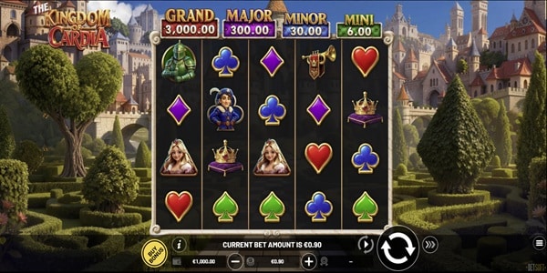 The Kingdom of Cardia Slot Game | Betsoft – Weekly Review The Kingdom of Cardia slot reels showing card suit symbols, royal character symbols, jackpot values above the grid and a castle garden background.