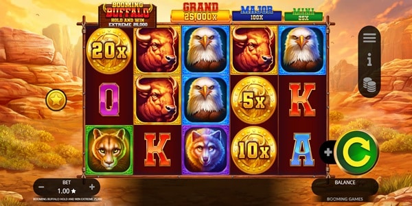 Booming Buffalo Hold and Win Extreme 25,000 Slot Game | Booming Games – Weekly Review Booming Buffalo Hold and Win Extreme 25,000 slot reels showing buffalo, eagle, wolf, cougar and multiplier coin symbols on a desert-themed game screen.