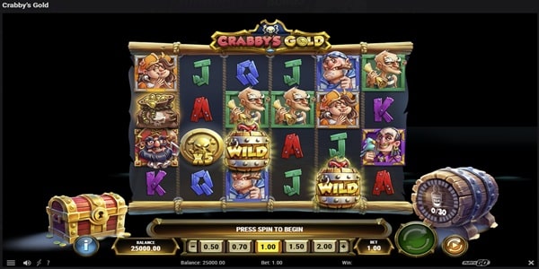 crabbys-gold-slot-reels-screenshot-playngo Crabby's Gold slot reels showing pirate character symbols, wild barrels, letter symbols and a treasure chest on a dark pirate-themed game screen.